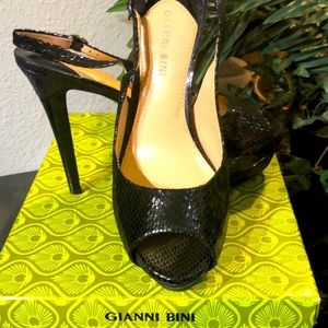Black snake skin platform heels. 3” heel